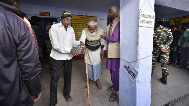 An old man is helped as he emerges after casting his vote today. (Arun Sharma/HT PHOTO) An old man is helped as he emerges after casting his vote today. (Arun Sharma/HT PHOTO)