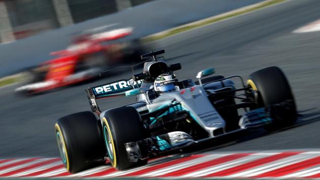 Mercedes Formula One team’s Valtteri Bottas leads Ferrari's Sebastian Vettel during testing at Circuit de Catalunya in Barcelona on Monday.(REUTERS)