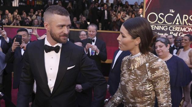 Justin Timberlake (left), and Jessica Biel arrive at the Oscars on Monday. (AP)