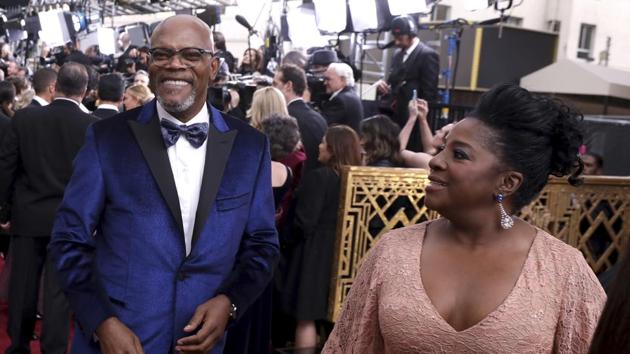Samuel L. Jackson (left) and LaTanya Richardson arrive at the Oscars on Monday. (AP)