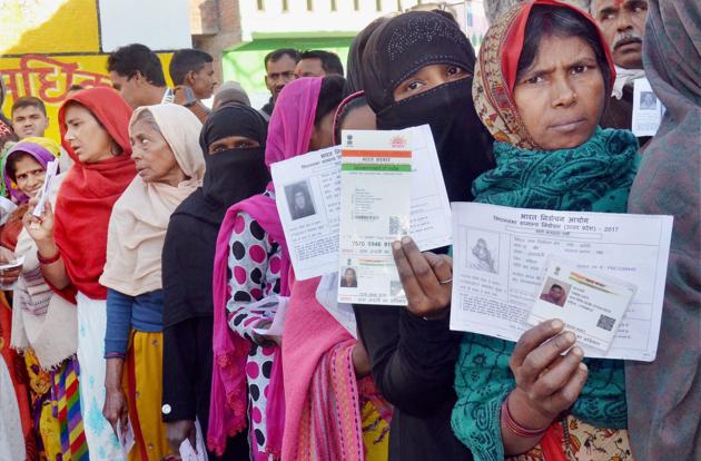 Women queue up at a polling booth in Amethi during the fifth phase of the assembly elections in Uttar Pradesh, February 27