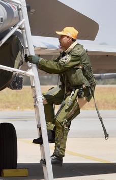 Bengaluru : Reliance Group Chairman Anil Ambani climbs in the cockpit of Rafale aircraft before a sortie during the 2nd day of the 11th biennial edition of Aero India 2017 at Yelahanka Air base in Bengaluru on Wednesday. (PTI) Bengaluru : Reliance Group Chairman Anil Ambani climbs in the cockpit of Rafale aircraft before a sortie during the 2nd day of the 11th biennial edition of Aero India 2017 at Yelahanka Air base in Bengaluru on Wednesday. (PTI)