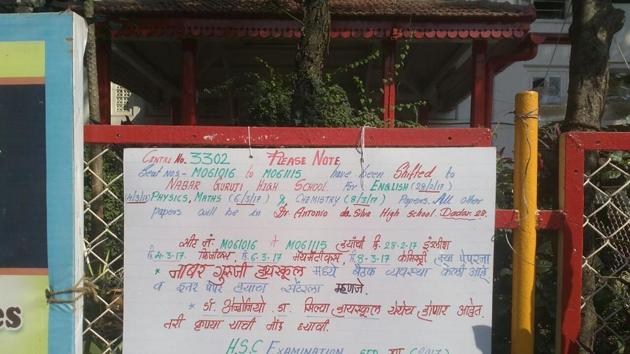 Confusion prevailed outside Antonio D’silva School in Dadar as seat numbers MO61016 to MO61115 were moved to Nabar Guruji School due to lack of space. The school put up a sign outside its gate directing students to the new centre. (HT photo) Confusion prevailed outside Antonio D’silva School in Dadar as seat numbers MO61016 to MO61115 were moved to Nabar Guruji School due to lack of space. The school put up a sign outside its gate directing students to the new centre. (HT photo)