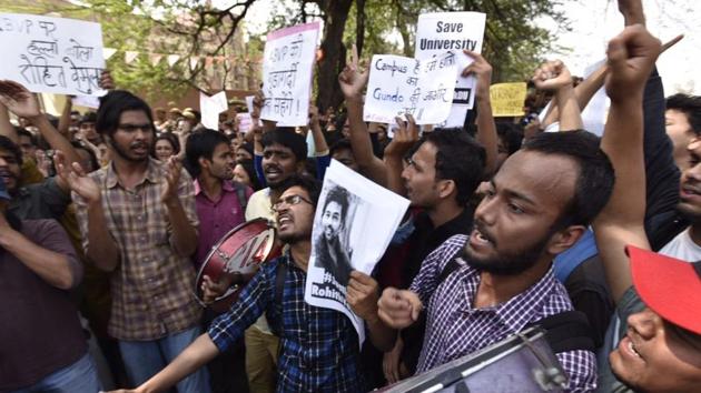 Students hold posters of late Dalit scholar Rohith Vemua as they shout slogans against the ABVP at Delhi University on February 28., 2017 (Raj K Raj/ HT Photo) Students hold posters of late Dalit scholar Rohith Vemua as they shout slogans against the ABVP at Delhi University on February 28., 2017 (Raj K Raj/ HT Photo)