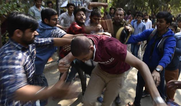 Activists of ABVP beating Ramjas students after JNU student Umar Khalid was invited to the college for a literary festival. (Raj K Raj/HT Photo) Activists of ABVP beating Ramjas students after JNU student Umar Khalid was invited to the college for a literary festival. (Raj K Raj/HT Photo)