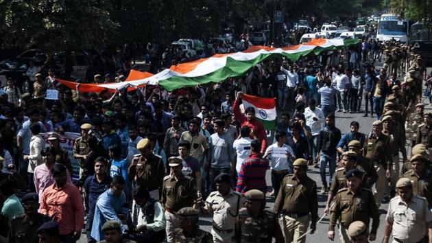 Akhil Bharatiya Vidyarthi Parishad members carry out Tiranga Rally on Tuesday. (AFP) Akhil Bharatiya Vidyarthi Parishad members carry out Tiranga Rally on Tuesday. (AFP)