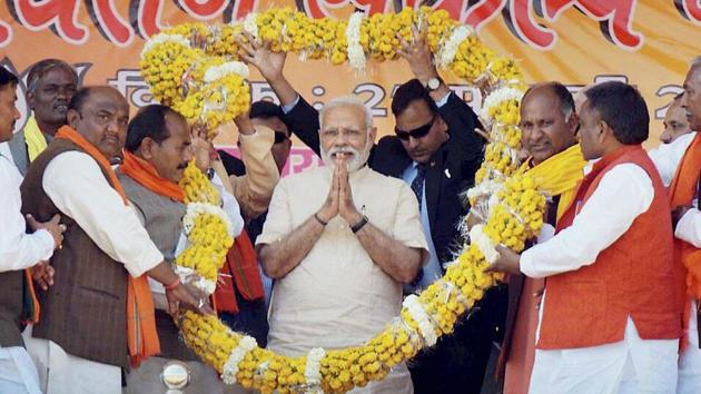 Prime Minister Narendra Modi welcomed at an election rally at Mau in Uttar Pradesh on Monday. PTI (PTI) Prime Minister Narendra Modi welcomed at an election rally at Mau in Uttar Pradesh on Monday. PTI (PTI)