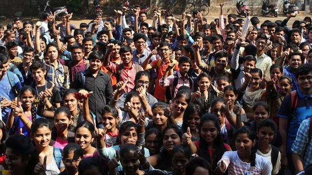 To help students reach exam centres on time, NGOs and volunteers arranged pickup and drop services. Volunteers were ready with cars and bikes to ferry students and even carried extra stationery items such as pencil boxes and pens. (Praful Gangurde/HT PHOTO) 