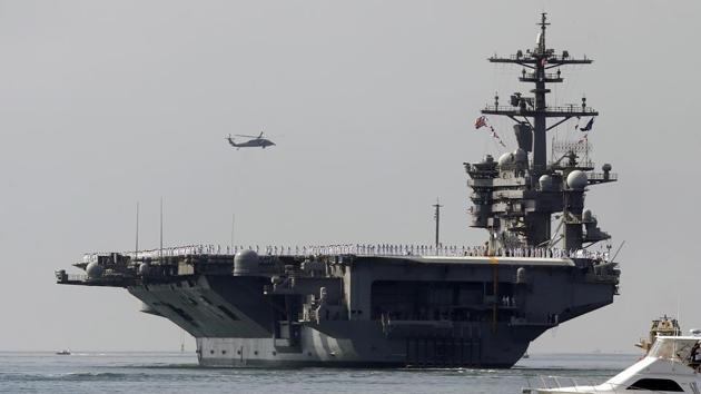 A US aircraft carrier, USS Carl Vinson . The US Navy is planning a fresh freedom of navigation operation around China’s man-made islands, the first under President Donald Trump, Navy Times reported, citing defense officials (AP File Photo) A US aircraft carrier, USS Carl Vinson . The US Navy is planning a fresh freedom of navigation operation around China’s man-made islands, the first under President Donald Trump, Navy Times reported, citing defense officials (AP File Photo)
