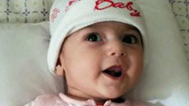 This undated photo shows Fatemeh Reshad, an infant from Iran, who was recently treated for a life-threatening heart condition at a hospital in Oregon. The 4-month-old infant was flown to Portland for her life-saving heart surgery after she was temporarily banned from coming into the U.S. by President Donald Trump's travel ban. (AP) This undated photo shows Fatemeh Reshad, an infant from Iran, who was recently treated for a life-threatening heart condition at a hospital in Oregon. The 4-month-old infant was flown to Portland for her life-saving heart surgery after she was temporarily banned from coming into the U.S. by President Donald Trump's travel ban. (AP)