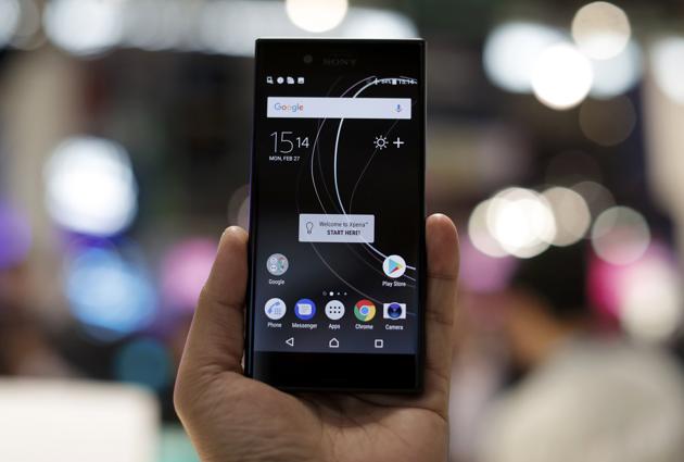 A man holds up a new Sony Xperia device at Mobile World Congress in Barcelona, Spain. (REUTERS) A man holds up a new Sony Xperia device at Mobile World Congress in Barcelona, Spain. (REUTERS)