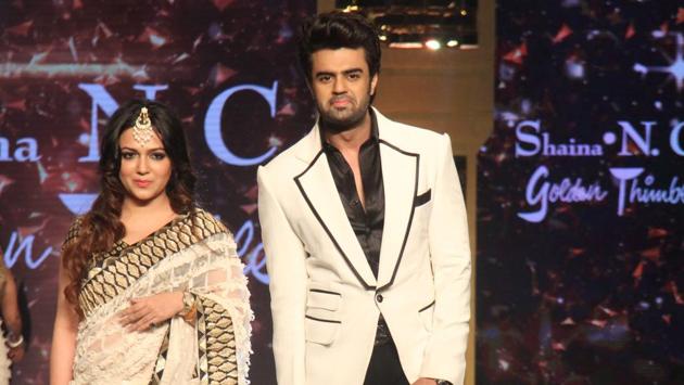 Actor-TV personality Manish Paul with his wife Sanyukta displaying the creation of fashion designer Shaina NC. (Pramod Thakur/HT Photo) Actor-TV personality Manish Paul with his wife Sanyukta displaying the creation of fashion designer Shaina NC. (Pramod Thakur/HT Photo)