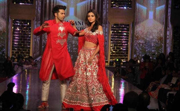 Actors Alia Bhatt and Varun Dhawan walk the ramp for designers Abu Jani and Sandeep Khosla at the 12th annual 'Caring with Style' fashion show in Mumbai on Sunday. (Pramod Thakur/HT Photo) Actors Alia Bhatt and Varun Dhawan walk the ramp for designers Abu Jani and Sandeep Khosla at the 12th annual 'Caring with Style' fashion show in Mumbai on Sunday. (Pramod Thakur/HT Photo)
