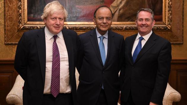 British foreign secretary Boris Johnson (left) and international trade secretary Liam Fox (right) with finance minister Arun Jaitley during his visit to London.(AFP File)