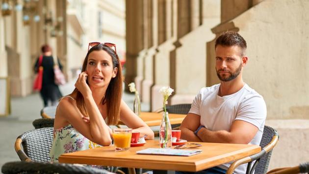Giving more attention to your phone while on a date takes the smartphone addiction to a different level. (Shutterstock) Giving more attention to your phone while on a date takes the smartphone addiction to a different level. (Shutterstock)