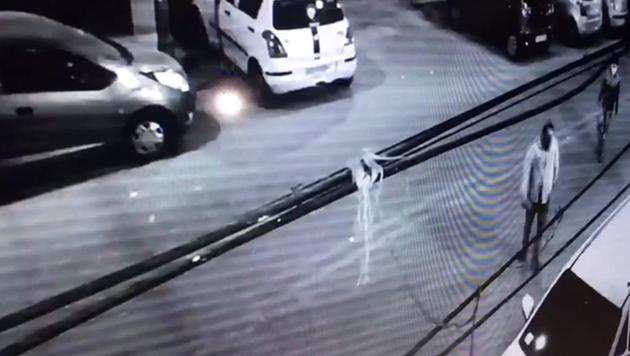 The two men caught on the CCTV camera. The two men caught on the CCTV camera.