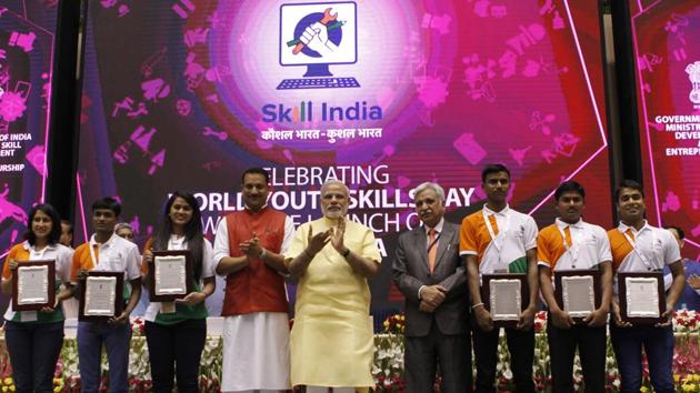 PM Modi with Rajiv Pratap Rudy, MoS for skill development and entrepreneurship, at the launch of the National Skill Development Mission in New Delhi.(Virendra Singh Gosain/HT File Photo)