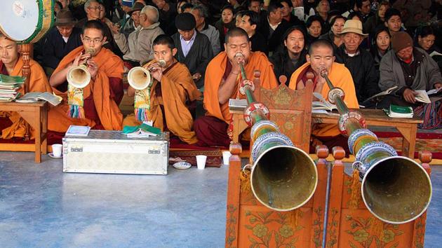 Tibetan Buddhist monks blow ceremonial horns during a special morning prayer session on the third day of ‘Losar’, or Tibetan New Year, in Dharamsala . Tibetan Buddhist monks blow ceremonial horns during a special morning prayer session on the third day of ‘Losar’, or Tibetan New Year, in Dharamsala .