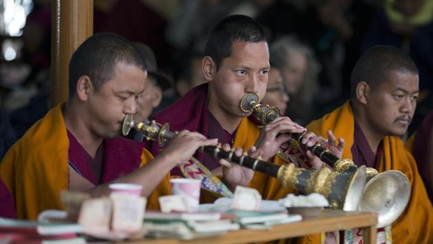 Tibetan Buddhist monks play ceremonial horns during a special prayer ceremony on the third day of the Tibetan New Year called 'Losar' in Dharmsala. (Ashwini Bhatia / AP) Tibetan Buddhist monks play ceremonial horns during a special prayer ceremony on the third day of the Tibetan New Year called 'Losar' in Dharmsala. (Ashwini Bhatia / AP)