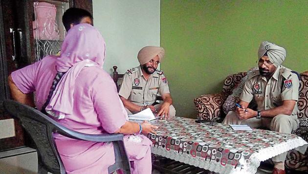 SP, investigation, Balbir Singh interacting with the kin of an arrested drug peddler at Boot village in Kapurthala. (HT File Photo) SP, investigation, Balbir Singh interacting with the kin of an arrested drug peddler at Boot village in Kapurthala. (HT File Photo)