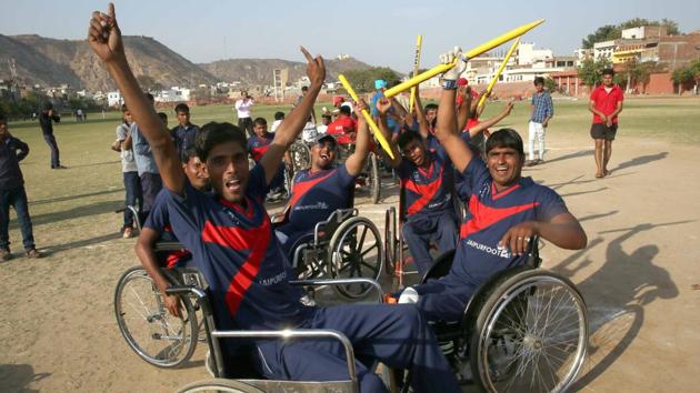 Rajasthan team players celebrate after defeating Punjab in the finals of Two Day National Triangular Wheelchair T-20 Cricket Series at Chaugan stadium.