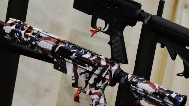 A rifle dipped in an American flag coating is seen at a National Rifle Association outdoor sports trade show in Harrisburg, Pennsylvania. (AFP File Photo) A rifle dipped in an American flag coating is seen at a National Rifle Association outdoor sports trade show in Harrisburg, Pennsylvania. (AFP File Photo)