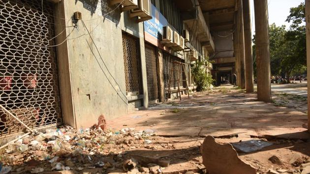 The city centre is often littered with garbage left by visitors. It’s also ill maintained with broken tiles and pools of dirty water.(Sanjeev Sharma/HT)