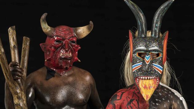 Revelers in disguise is pictured during a carnival in San Martin Tilcajete, Oaxaca state, Mexico. (Omar Torres/AFP) Revelers in disguise is pictured during a carnival in San Martin Tilcajete, Oaxaca state, Mexico. (Omar Torres/AFP)