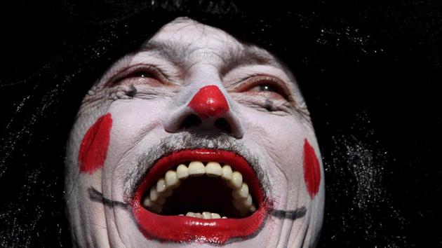 A clown-faced reveler smiles wide as he takes part in the "Galo da Madrugada" or the Morning Rooster carnival parade, in downtown Recife, in the Brazilian state of Pernambuco. The "Galo da Madrugada" took to the streets for the first time in 1975 with the aim of rescuing the traditional carnival of Recife. It is now considered one of the largest carnival parades. (Eraldo Peres/AP) A clown-faced reveler smiles wide as he takes part in the "Galo da Madrugada" or the Morning Rooster carnival parade, in downtown Recife, in the Brazilian state of Pernambuco. The "Galo da Madrugada" took to the streets for the first time in 1975 with the aim of rescuing the traditional carnival of Recife. It is now considered one of the largest carnival parades. (Eraldo Peres/AP)