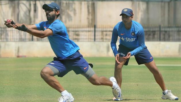 Indian cricketer Ajinkya Rahane (L) takes a catch during the Indian cricket team's practice session at the M. Chinnaswamy Stadium in Bengaluru. (AFP) Indian cricketer Ajinkya Rahane (L) takes a catch during the Indian cricket team's practice session at the M. Chinnaswamy Stadium in Bengaluru. (AFP)