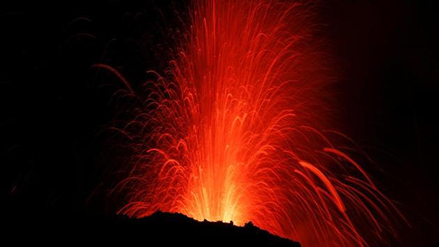 Mount Etna erupted spewing fountains of bright orange lava toward the night skies over Sicily. (Antonio Parrinello / REUTERS)