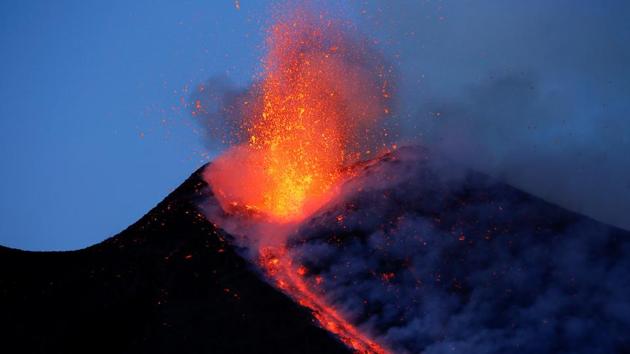 Italy's Mount Etna, Europe's tallest and most active volcano, spews lava as it erupts on the southern island of Sicily, Italy. (Antonio Parrinello / REUTERS)