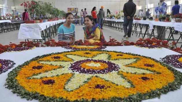A rangoli made with fresh flowers at the agri varsity on Wednesday. (Gurminder Singh/HT Photo)