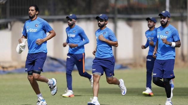Indian cricketers warm up during a training session ahead of their second cricket test match against Australia in Bangalore, India, Wednesday, March 1, 2017. (AP Photo/Aijaz Rahi) (AP) Indian cricketers warm up during a training session ahead of their second cricket test match against Australia in Bangalore, India, Wednesday, March 1, 2017. (AP Photo/Aijaz Rahi) (AP)