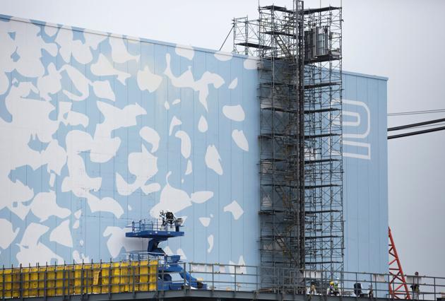 Workers work on the Unit 2 reactor building at Tokyo Electric Power Co.'s (TEPCO) Fukushima Dai-ichi nuclear power plant in Fukushima, Japan. The Fukushima accident, liability concerns, depressed global energy prices and other issues have clouded the future of nuclear power in India and the world. (AFP) Workers work on the Unit 2 reactor building at Tokyo Electric Power Co.'s (TEPCO) Fukushima Dai-ichi nuclear power plant in Fukushima, Japan. The Fukushima accident, liability concerns, depressed global energy prices and other issues have clouded the future of nuclear power in India and the world. (AFP)