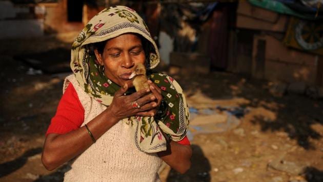 Hearing and speech impaired by birth, Mumtaz Begum often spends her time with her pet birds at Nizamuddin Slums. People with disabilities living in slums have little or no recourse to supportive therapies and often make do with the resources that they have. In Delhi alone, an estimated 1.7 million people live in slums, which is about 15% of the capital’s population. (Burhaan Kinu/HT PHOTO) Hearing and speech impaired by birth, Mumtaz Begum often spends her time with her pet birds at Nizamuddin Slums. People with disabilities living in slums have little or no recourse to supportive therapies and often make do with the resources that they have. In Delhi alone, an estimated 1.7 million people live in slums, which is about 15% of the capital’s population. (Burhaan Kinu/HT PHOTO)