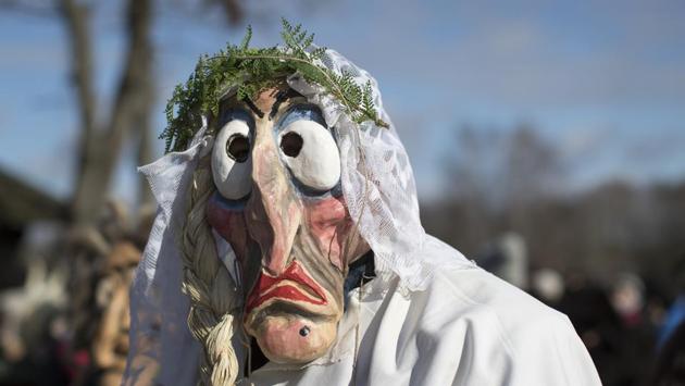 A reveller wearing a traditional carnival mask takes part in Shrovetide celebrations, in Rumsiskes village, some 89 kilometres (56 miles) north of Vilnius, Lithuania.Shrovetide is a traditional Lithuanian holiday marking the end of winter, one of the merriest events in Lithuania. (Mindaugas Kulbis/AP) A reveller wearing a traditional carnival mask takes part in Shrovetide celebrations, in Rumsiskes village, some 89 kilometres (56 miles) north of Vilnius, Lithuania.Shrovetide is a traditional Lithuanian holiday marking the end of winter, one of the merriest events in Lithuania. (Mindaugas Kulbis/AP)
