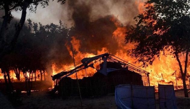 Huts go up in flames during police operation to evict squatters from Jawahar Bagh in Mathura on June 2, 2016. (PTI file photo) Huts go up in flames during police operation to evict squatters from Jawahar Bagh in Mathura on June 2, 2016. (PTI file photo)