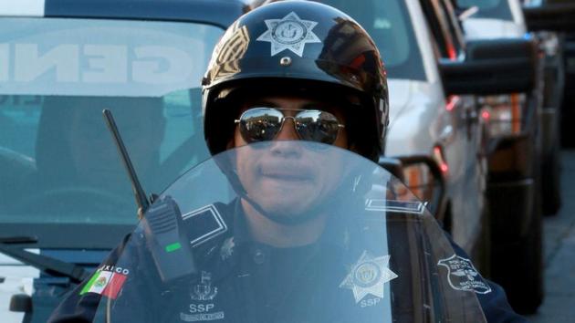 Interior minister Miguel Angel Osorio on Tuesday had just announced the deployment of military police to fight drug gangs in the state.(AFP Photo)