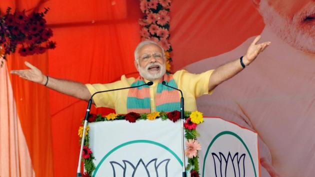 Prime Minister Narendra Modi addresses an election campaign rally in Maharajganj district on Wednesday.(PTI File)