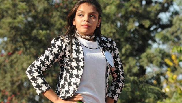A girl during ramp walk at Gain Jyoti Institute on Thursday. (Anil Dayal/HT Photo )