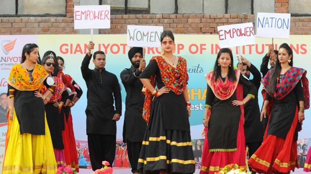 College students during a performance on women empowerment in SAS Nagar on Thursday. (Anil Dayal/HT Photo )
