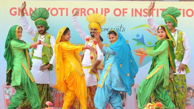 Students performing Punjabi folk dance. (Anil Dayal/HT Photo )
