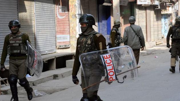 Central Reserve Police Force (CRPF) soldiers stand guard during a curfew in Srinagar.(File Photo)