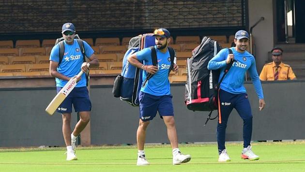 Indian cricket team captain Virat Kohli, R Ashwin and Karun Nair arrive for a training session ahead second Test against Australia in Bangalore. (PTI) Indian cricket team captain Virat Kohli, R Ashwin and Karun Nair arrive for a training session ahead second Test against Australia in Bangalore. (PTI)