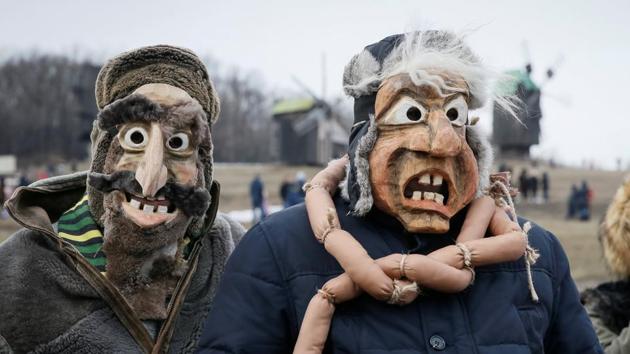 Masked revellers take part in celebration of Maslenitsa also known as Kolodiy, a pagan holiday marking the end of winter, in Kiev, Ukraine. (Valentyn Ogirenko/REUTERS) Masked revellers take part in celebration of Maslenitsa also known as Kolodiy, a pagan holiday marking the end of winter, in Kiev, Ukraine. (Valentyn Ogirenko/REUTERS)