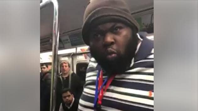 A screengrab from a video in which an African-American allegedly hurled abuses at an Indian-origin woman on a train in New York. Police said the man appeared to be “emotionally unstable”.(Facebook/ Kundan Srivastava)