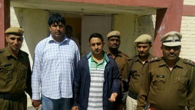 The duo – Yuvraj (32), a resident of Bamdola, Jhajjar, and Rajesh (37), a resident of Badhani, Jhajjar — were arrested while trying to escape from Delhi, the police said. (HT Photo) The duo – Yuvraj (32), a resident of Bamdola, Jhajjar, and Rajesh (37), a resident of Badhani, Jhajjar — were arrested while trying to escape from Delhi, the police said. (HT Photo)