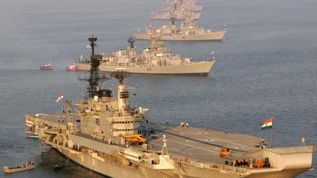 The Indian Navy's INS Viraat (foreground) anchored alongside other ships, on the eve of Indian President's Abdul Kalam's fleet review in Visakhapatnam in February 2006. (REUTERS)