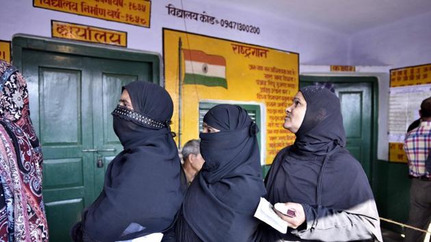 Voters queue up to cast votes at a polling station in Ayodhya, February 27. (Arun Sharma/HT PHOTO) Voters queue up to cast votes at a polling station in Ayodhya, February 27. (Arun Sharma/HT PHOTO)